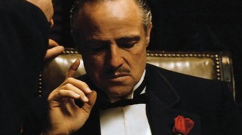 Vito Corleone listening