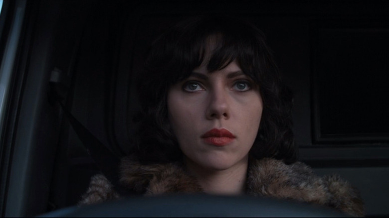 Scarlett Johansson sitting in car in Under the Skin