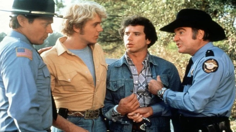 Tom Wopat, John Schneider, and James Best in The Dukes of Hazzard